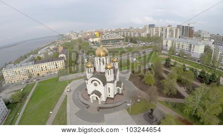 SAMARA - MAY 05, 2015: Cityscape with church of St. George on Glory Square at spring cloudy day. Aerial view video frame