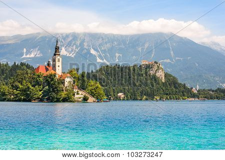 Catholic Church On Island On Bled Lake And Bled Castle