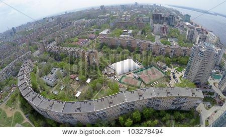 Urban sector on shore of Volga river at spring sunny day. Aerial view video frame