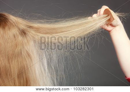Closeup Of Woman With Static Blonde Hair.