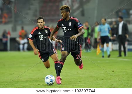 Kingsley Coman (r) And Juan Bernat (l) During The Uefa Champions League Game Between Olympiacos And