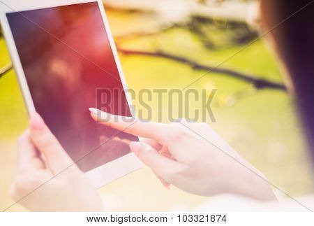 Girl Using Tablet Or Ebook Outdoor Closeup Screen