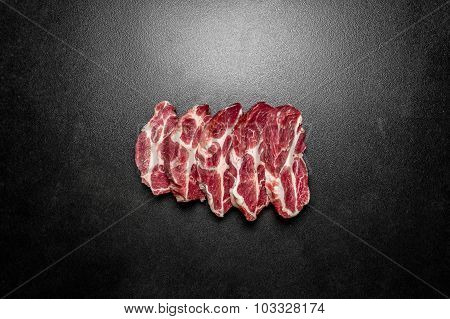 Overhead view raw pieces of pork