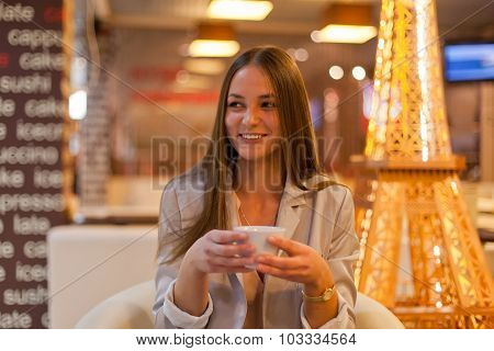 Beautiful Girl Drinking Tea Or Coffee In Cafe.