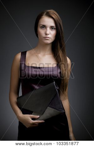 Elegant, Beautiful Woman With Clutch Bag