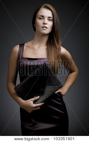 Elegant, Beautiful Woman With Clutch Bag