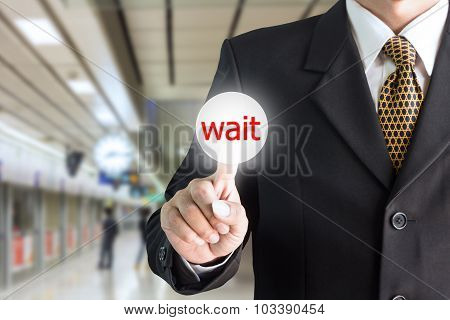 Businessman hand pointing on the screen press the button wait - can be used for editing text or imag