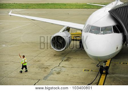 Airplane Connected To Jetway