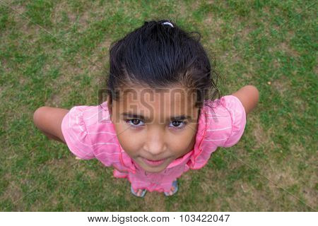 Happy Gypsy Child Girl Smiling, Shot From Above Perspective