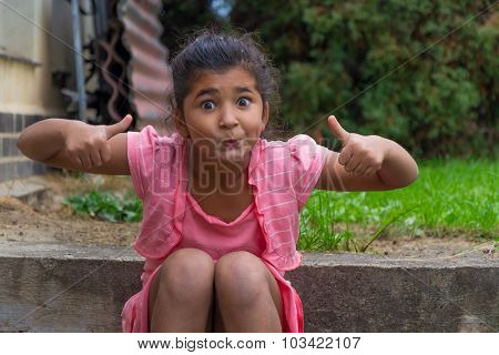 Small child enthusiastic gesticulating