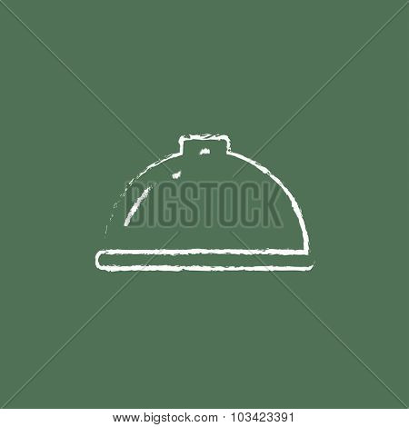 Restaurant cloche hand drawn in chalk on a blackboard vector white icon isolated on a green background.