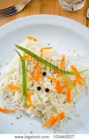 basmati rice with carrot, chive and bell pepper