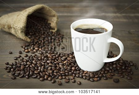 Coffee Cup And Coffee Beans.
