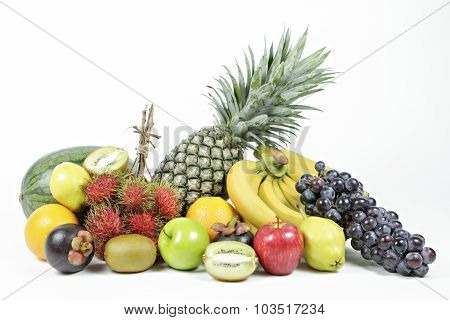 Fresh Various Fruits On Isolated White Background.