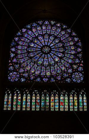 PARIS, FRANCE - SEPTEMBER 8, 2014: Paris Notre Dame Cathedral. North transept rose window. The Glorification of the  Mary