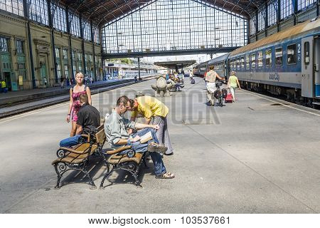 Unidentified People Wait At  The Train Station In Budapest