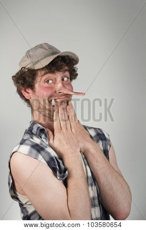 Shocked redneck jumps back in fear as his lying nose grows