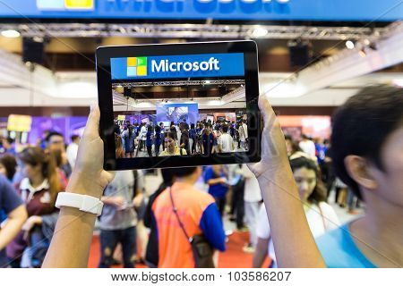 Bangkok Thailand - October 03: Hand Use Tablet Capture Crowd In Thailand Mobile Expo Event On Octobe