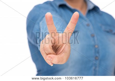 Hand with two fingers up in the peace or victory symbol. Also the sign for the letter V in sign language. Isolated on white.