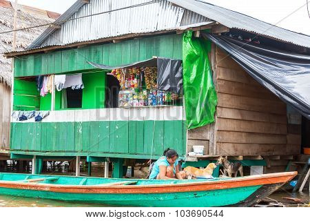 Canoe And Market In Iquitos, Peru
