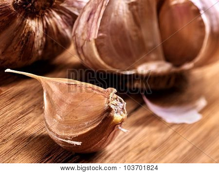 Clove of  garlic  on  wooden board. 