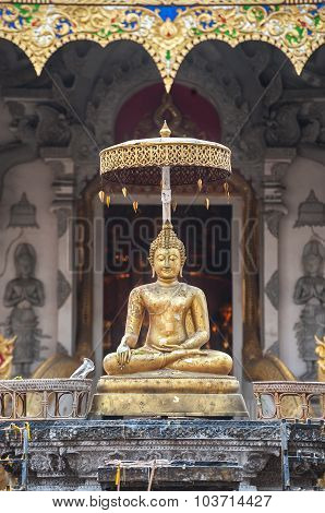 Golden Buddha Statue Outside The Entrance To Wat Chedi Luang, Chiang Mai, Thailand