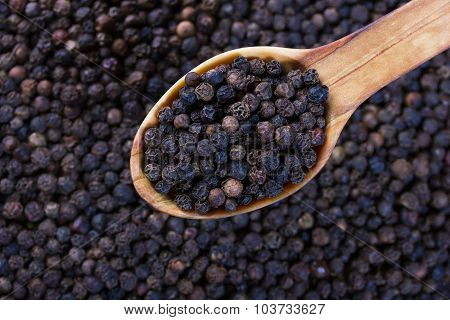 Black Pepper In Wooden Spoon