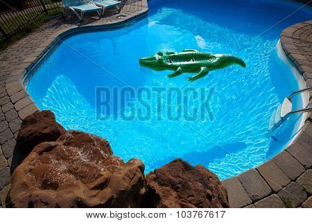 Beautiful swimming pool with a blue clear water.
