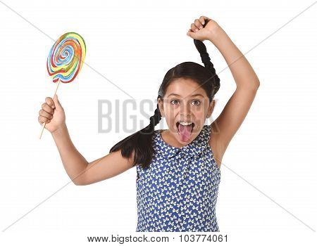 Happy Female Child Holding Big Lollipop Candy Pulling Pony Tail With Crazy Funny Face Expression In