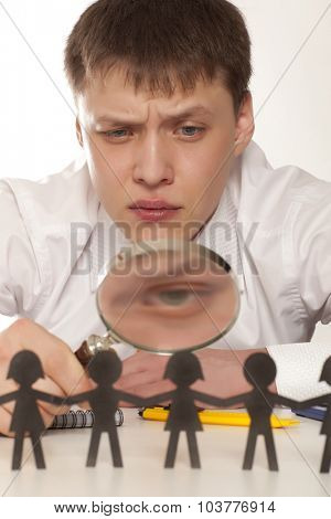 The boss looks at a group of people. Bureaucrat