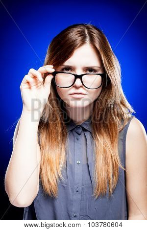 Young Woman Looking Through The Nerd Glasses