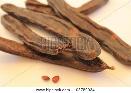 Carob pods dry with seeds
