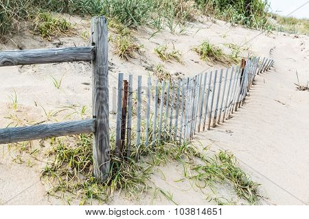 Pickett Fence and Wooden Railing with Beach Grass and Dunes at Sandbridge