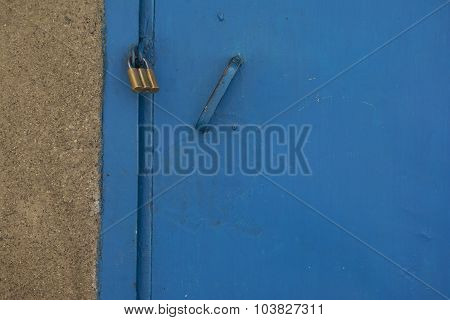 Padlock On A Blue Door
