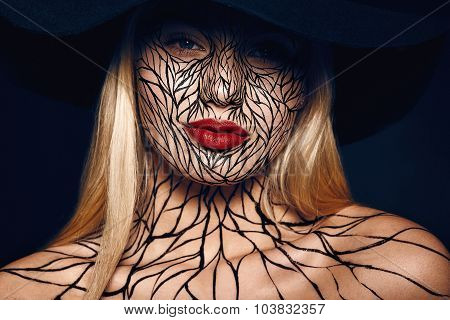 fashion portrait of girl with faceart