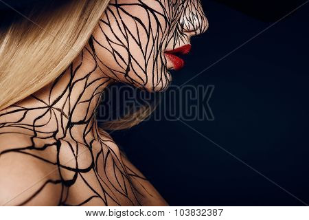 fashion portrait of girl with faceart