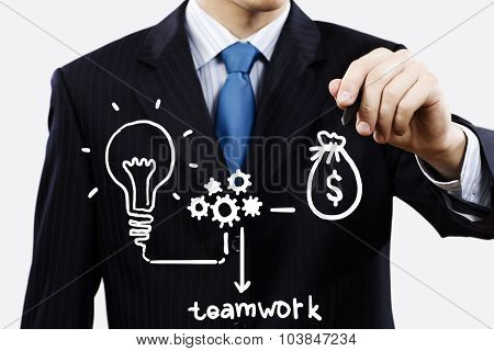 Close up of businessman drawing money making formula