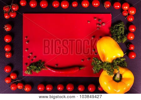 Fresh vegetables on a black table. Autumn background.
