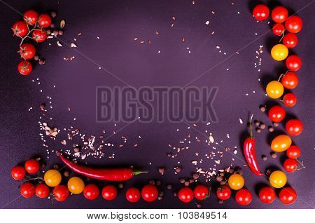 Fresh vegetables on a black table. Autumn background.