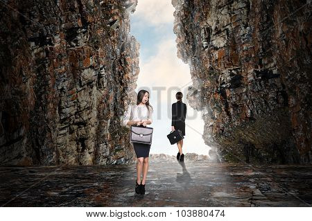 Business person in the cave
