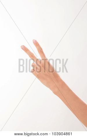 Woman showing two fingers