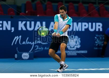 KUALA LUMPUR, MALAYSIA - SEPTEMBER 26, 2015: Mischa Zverev of Germany plays his qualifying match in the Malaysian Open 2015 Tennis tournament held at the Putra Stadium, Malaysia.
