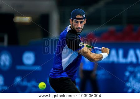 KUALA LUMPUR, MALAYSIA - SEPTEMBER 26, 2015: Luca Vanni of Italy plays his qualifying match in the Malaysian Open 2015 Tennis tournament held at the Putra Stadium, Malaysia.