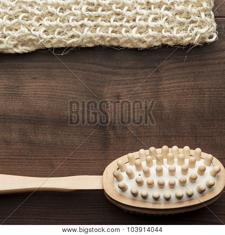 wooden massager brush on the table