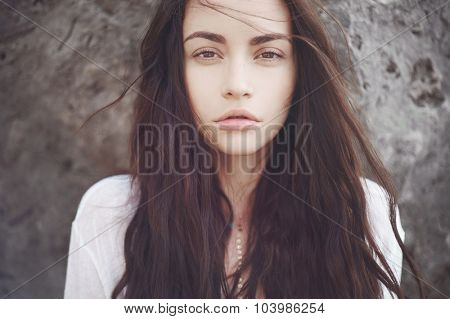 Outdoors portrait of beautiful romantic lady with magnificent hair