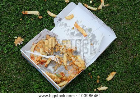 Fast food discarded on the floor.