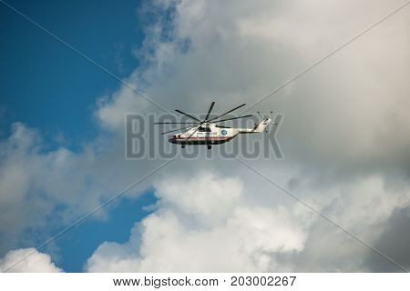 Khabarovsk, Russia - September 3, 2017: Mi-26 heavy military transport helicopter in flight in flight in the colors of the Ministry of emergency situations of Russia