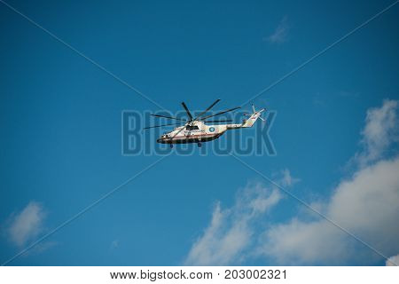 Khabarovsk, Russia - September 3, 2017: Mi-26 heavy military transport helicopter in flight in flight in the colors of the Ministry of emergency situations of Russia