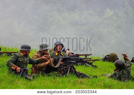 Soldiers with machine guns.The VIII International Festival of Military History and remake for the battle `1944` 6.08.2016 in Valga, Estonia