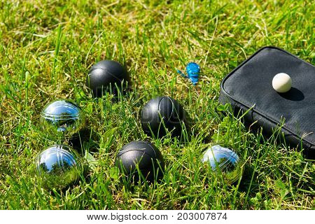 Six different balls for playing bocce on the lawn
